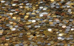 Coins in water