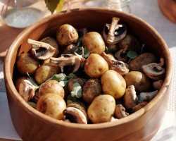 wooden bowl with potatoes and mushrooms